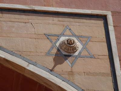 The star of David. Except this has nothing to do with Judaism, because this symbol was already used in Hinduism long before Judaism existed.